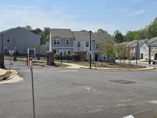 A modern gated community with landscaped grounds in Aviary Park by Starlight Homes, Atlanta, GA.