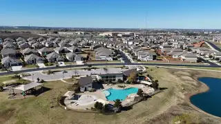 Community Amenities A beautiful aerial view showcasing the vibrant community and amenities of Saddle Creek Twinhomes by Pacesetter Homes (Georgetown, TX).