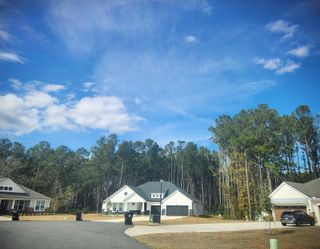 Charming homes surrounded by lush trees in Fox Meadows by Maronda Homes (Middleburg, FL).