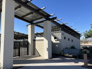 A modern structure with sleek metal accents in Avion: Arbor by Lennar. Located in Goodyear, AZ.