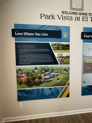 An informative display welcomes residents to Park Vista at El Tesoro by LGI Homes, highlighting community amenities.