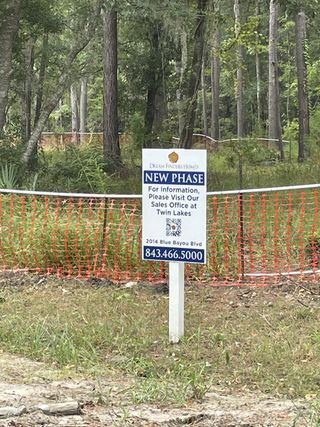 New phase coming to Waterloo Estates by Dream Finders Homes in Johns Island, SC, with lush wooded surroundings.