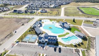 Resort-style amenities with pools and tennis courts in Santa Rita Ranch by CastleRock Communities (Liberty Hill, TX).
