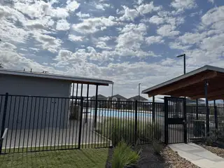 Community Amenities A modern community pool and pavilion in Firefly Pointe: Stonehill Collection by Lennar nestled in Hutto, TX.