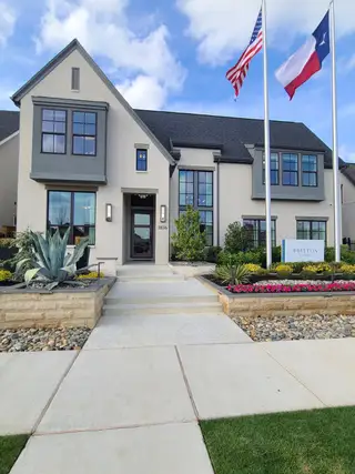 A beautiful modern home with manicured landscape in Fields 60' by Britton Homes (Frisco, TX).