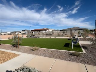 A scenic community area with lush landscaping in The Skyview Collection at North Copper Canyon by Century Communities (Surprise, AZ).