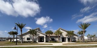 Community Amenities A beautiful modern home with palm trees in Storey Creek: Manor Collection by Lennar (Kissimmee, FL).