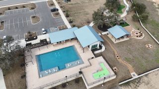Community Amenities Community amenities with a pool, pavilions, and a playground in Meyer Ranch by Princeton Classic Homes (New Braunfels, TX).