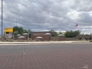 A welcoming entrance at Arroyo Vista II by KB Home, featuring manicured landscaping in Casa Grande, AZ.