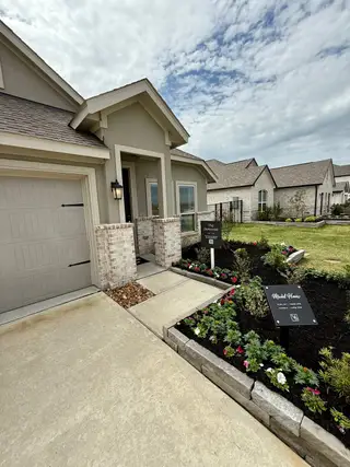Street view A charming façade with manicured landscaping in Lago Mar by Lennar (Texas City, TX).