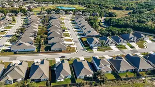 A picturesque neighborhood of charming single-story homes in Cypress Forest by Scott Felder Homes (Kyle, TX).