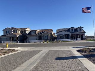 Charming homes with elegant facades and inviting atmosphere in Redwood Valley at Prasada by Fulton Homes (Surprise, AZ).