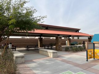 Community Amenities A modern community pavilion with seating in Bridle Park at Alamar by Richmond American Homes (Avondale, AZ).