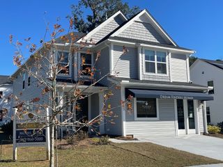 A charming two-story home with a neat facade in Windsor Crossing by Dream Finders Homes (North Charleston, SC).