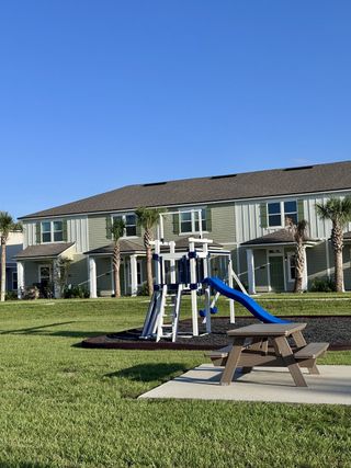 Community Amenities A beautiful community with a playground in Kindlewood Forest by D.R. Horton (Middleburg, FL).