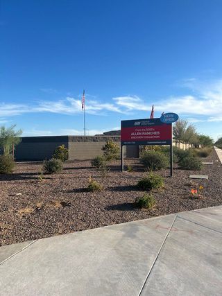 A modern landscape surrounds the sales center at Allen Ranches: Discovery Collection by Taylor Morrison (Litchfield Park, AZ).