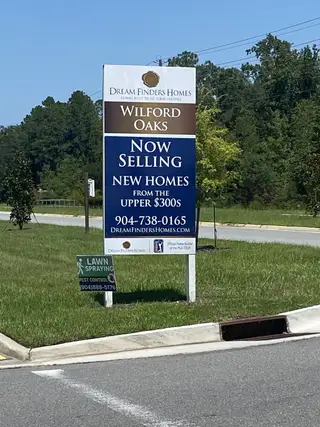 Street view New homes available in Wilford Oaks by Dream Finders Homes, Orange Park, FL, starting from the upper $300s.