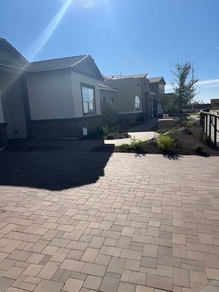 Street view Beautiful contemporary homes with manicured landscapes in Tierra Vistoso by Mattamy Homes (Surprise, AZ).