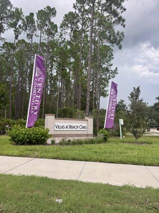 Discover The Villas at Bishop Oaks by Century Communities, nestled among lush greenery in Jacksonville, FL.