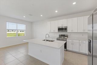 New construction Single-Family house 163 Bottle Brush Dr, Haines City, FL 33844 plan Aspire - image