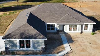 New construction Single-Family house 37136 Hidden Vw, Dade City, FL 33523 plan 2557 - image