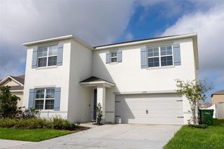 New construction Single-Family house 1063 Brimstone Cir, Winter Haven, FL 33884 plan ENSLEY - image
