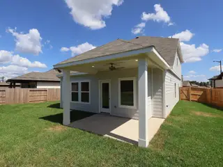 New construction Single-Family house 624 Roaring Falls Dr, Willis, TX 77378 plan Larkspur - Smart Series - image