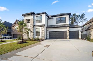 New construction Single-Family house 15716 Dandelion Dreams St, Conroe, TX 77302 plan Auburn II 4600.3 - image