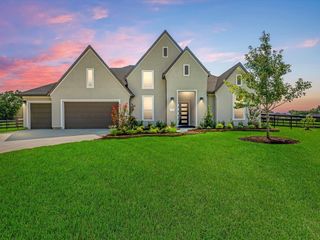 New construction Single-Family house 22 Woodland Creek Ct, Fulshear, TX 77441 plan Lisbon - image