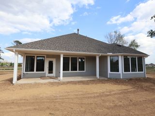 New construction  house 21711 Hibiscus Hedge Trl, Tomball, TX 77377 plan Highlander - Premier Collection - image