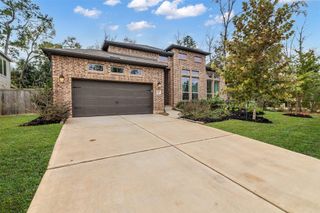 New construction Single-Family house 633 N Rivus Overlook Dr, Conroe, TX 77318 plan 3210W - image