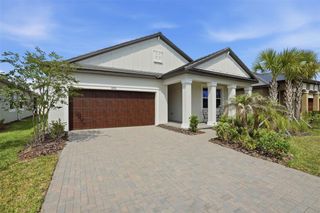 New construction Single-Family house 10770 Tupper Cay Dr, San Antonio, FL 33576 plan Sunburst II - image