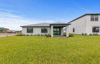 New construction house 616 Lakeside Oasis Ave, Lehigh Acres, FL 33974 plan Browning - image