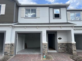 New construction house 5087 Prairie Preserve Run, St. Cloud, FL 34772 plan San Jose - Townhome Series - image