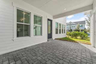 New construction Single-Family house 901 SW Bushel Trl, Palm City, FL 34990 plan Marigold - image