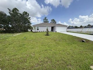 New construction Single-Family house 137 Maple Dr, Kissimmee, FL 34759 plan The Poinsettia - image