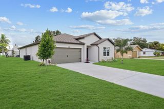 New construction  house 590 NW Archer Ave, Unit 37, Port St. Lucie, FL 34983 plan Passionflower II - image