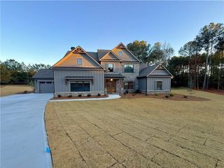 New construction Single-Family house 2316 Pebble Trl, Monroe, GA 30656 plan The Woodmont | Side Entry - image