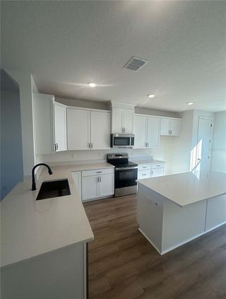 New construction Townhouse house 15274 Groveside Rd, Winter Garden, FL 34787 plan Lantana - image