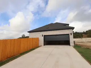 New construction Single-Family house 165 Antioch Church Dr, Buda, TX 78610 plan Hyacinth - Cottage Series - image