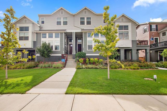 Central Park - North End - Row Homes by David Weekley Homes in Denver - photo